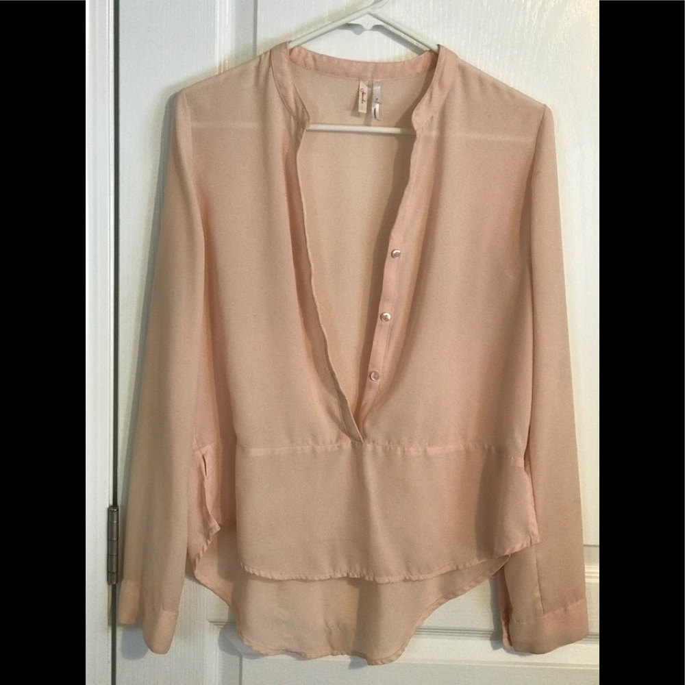 Light pink blouse from Nordstrom’s . Never worn